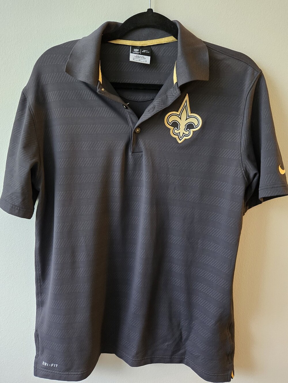 Nike Men’s Saints Dri Fit Charcoal Gray Polo with Gold Fleur-de-lis